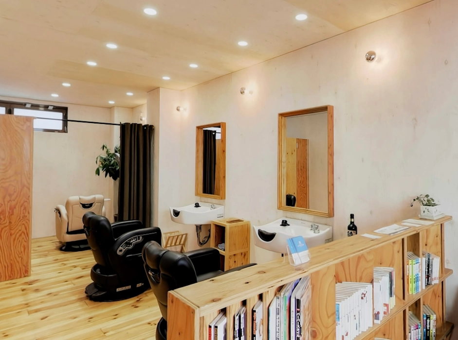 Cozy barbershop with wooden floors and barber chairs